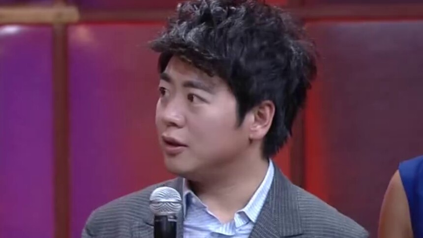 世界小姐用脚弹琴 郎朗用手“谈情”