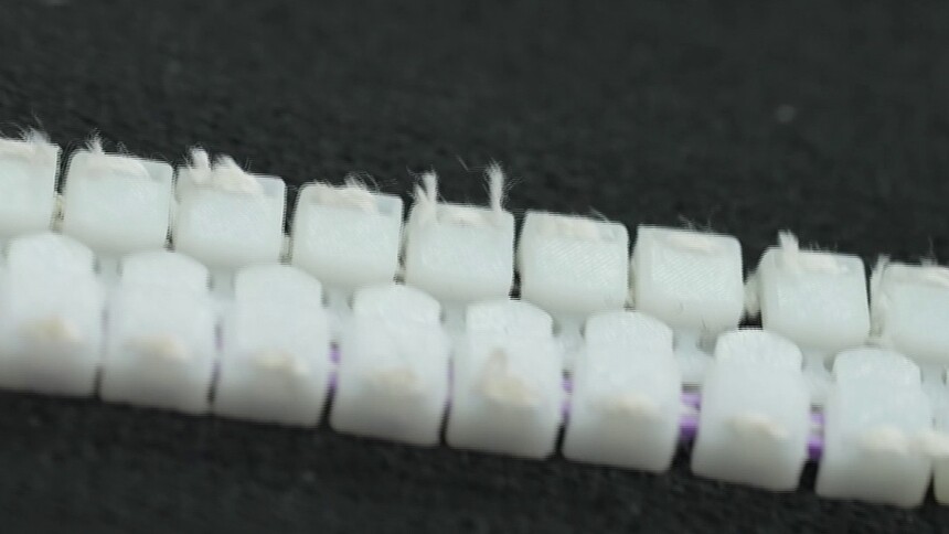 可伸缩拉链是如何做到链牙之间紧密互锁的？