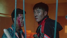林毅深入火场救伤员险象环生